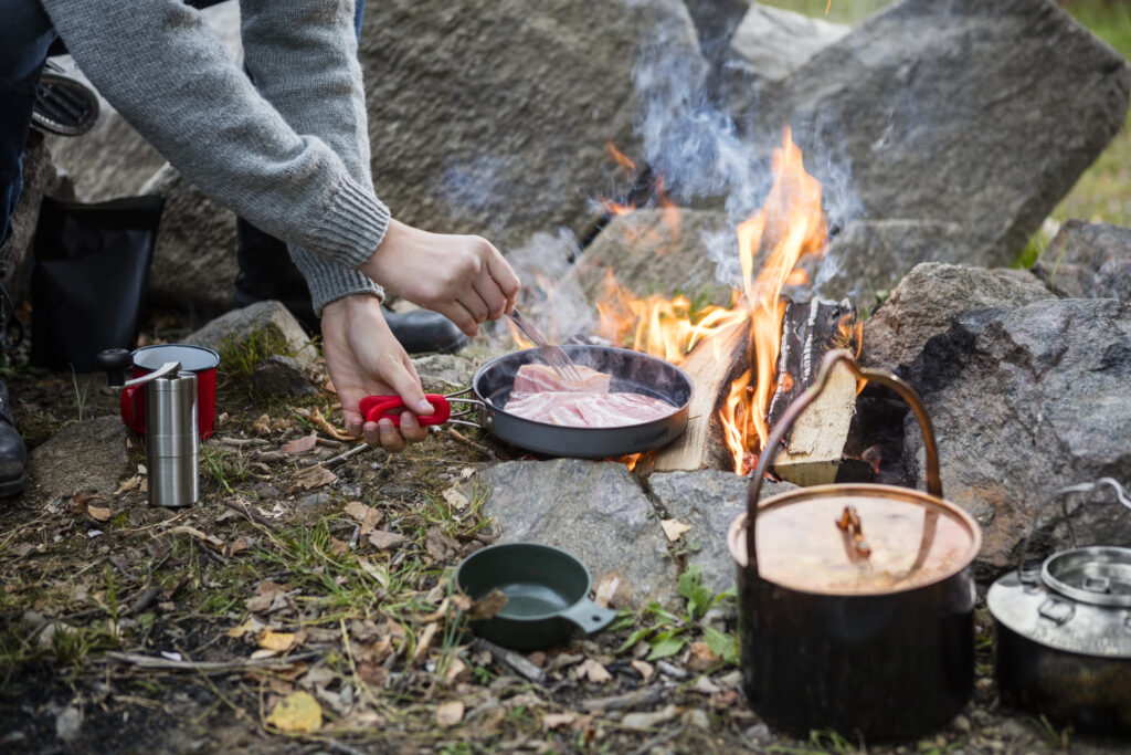 camping-cooking-over-fire